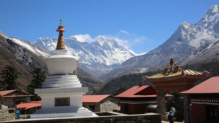 A-Stupa-and-brightly-painted-entry-in-a-village-on-the-way-to-Everest-Base-Camp.jpg